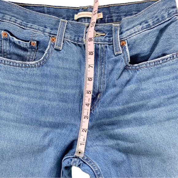 Levi’s Jeans Women’s Size 27 Low Pro Straight Distressed Medium Wash Blue Pants - Picture 11 of 13